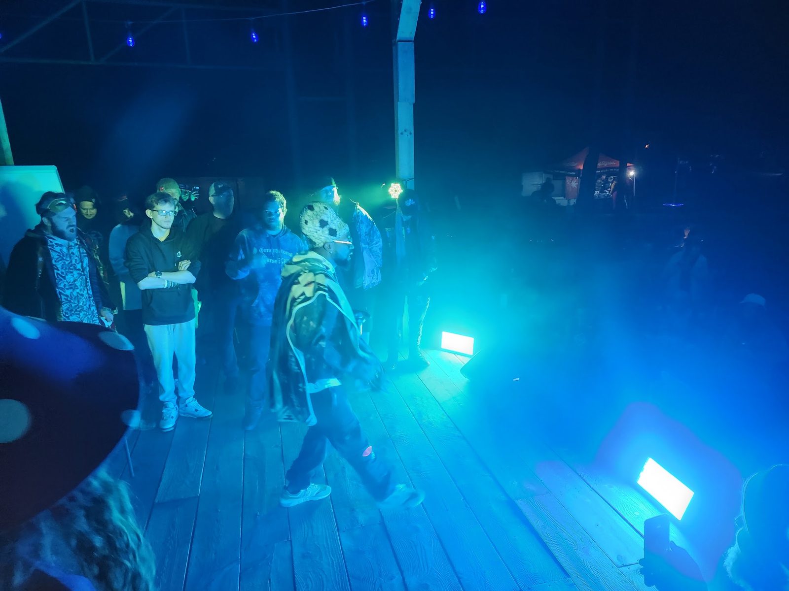 The circle gathered on the stage after dark