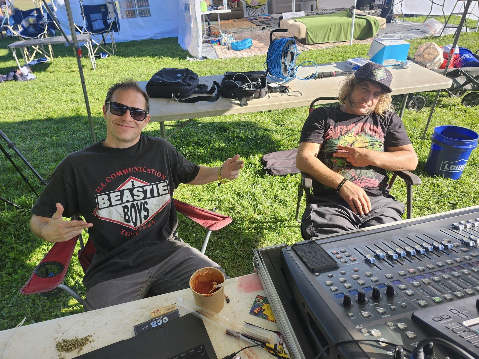 The sound team at the desk beside the stage